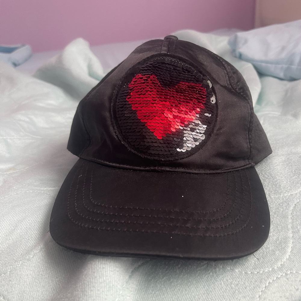 Black cap for women, reversible sequin heart. velcro closure. One size.